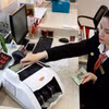 Ngân hàng tăng ưu đãi, cuộc đua vay mua nhà bước sang giai đoạn mới. (Ảnh: Vietnam+)