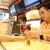 Kể từ ngày 10/10, giao dịch vàng miếng và vàng nhẫn sẽ áp dụng quy định mới. (Ảnh: Vietnam+)
