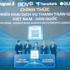 Đại diện Lãnh đạo Ngân hàng Nhà nước, NAPAS, GLN và Hana Bank bấm nút ra mắt dịch vụ thanh toán QR Việt Nam-Hàn Quốc. (Ảnh: Vietnam+)