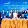 Đại diện ABBank và ABS ký thỏa thuận hợp tác. (Ảnh: Vietnam+)