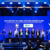 Đại diện lãnh đạo BIDV và VINASME trao Biên bản ghi nhớ hợp tác. (Ảnh: Vietnam+)