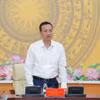 Phó Thống đốc Ngân hàng Nhà nước Phạm Quang Dũng phát biểu tại cuộc họp. (Ảnh: Vietnam+)