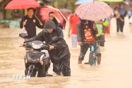 Cảnh ngập lụt sau những trận mưa lớn tại Narathiwat (Thái Lan). (Ảnh: THX/TTXVN)