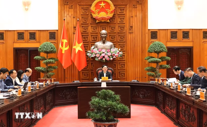 Phó Thủ tướng Hồ Quốc Dũng chủ trì cuộc họp với các bộ, ngành để cho ý kiến hoàn thiện về dự thảo Quyết định của Thủ tướng Chính phủ. (Ảnh: Xuân Tùng/TTXVN)