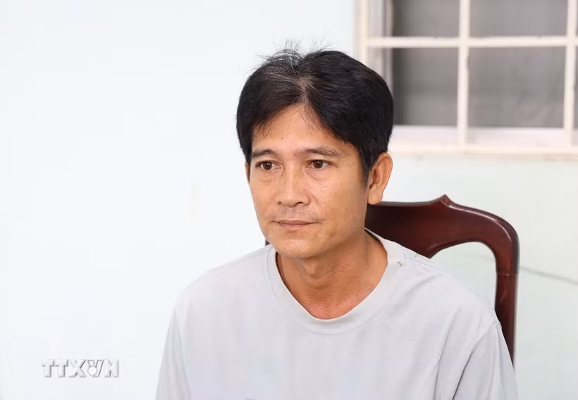 Đối tượng Lê Hoàng Ân tại Cơ quan điều tra. (Ảnh: TTXVN phát)