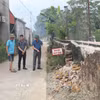 Ủy ban nhân dân xã Thanh Sơn (Ninh Bình) chỉ đạo khắc phục các vị trí bị ảnh hưởng, khoanh vùng, cắm biển cảnh báo và thông tin đến người dân. (Ảnh: Thùy Dung/TTXVN)