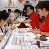 Mua, bán vàng tại Công ty Vàng Bảo Tính Mạnh Hải (ảnh tư liệu). (Ảnh: Trần Việt/TTXVN)
