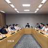 Toàn cảnh buổi làm việc giữa Đoàn đại biểu Tạp chí Cộng sản và Yonhap TV. (Ảnh: Đào Lâm/TTXVN)
