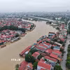 Nước sông Cầu dâng cao ngập nhà dân gần 2m, ngày 25/8/2026. (Ảnh: Thanh Thương/TTXVN)