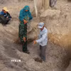 Lực lượng chức năng trên địa bàn tỉnh Quảng Ngãi tìm kiếm, quy tập hài cốt liệt sỹ. (Ảnh: Phạm Cường/TTXVN)