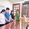 Cơ quan Cảnh sát điều tra Công an tỉnh Thanh Hóa thi hành Quyết định khởi tố vụ án, khởi tố bị can. (Ảnh: Công an Thanh Hóa)