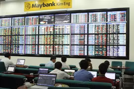 Giao dịch chứng khoán tại sàn Maybank KIM ENG (Thành phố Hồ Chí Minh). (Ảnh: Hoàng Hải/TTXVN)