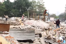 Nhiều hộ dân đã tháo dỡ, bàn giao mặt bằng từ năm 2010 nhưng đến nay dự án Công viên Tuổi trẻ vẫn chưa được triển khai xây dựng. (Ảnh: /TTXVN)