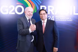 Thủ tướng Phạm Minh Chính và Tổng thống Brazil Luiz Inácio Lula da Silva. (Ảnh: Dương Giang/TTXVN)