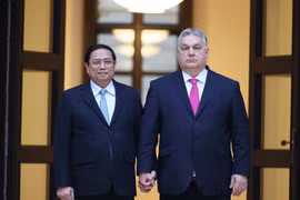 Thủ tướng Phạm Minh Chính và Thủ tướng Hungary Viktor Orbán. (Ảnh: Dương Giang-TTXVN)