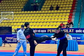 Sau lễ khai mạc Giải vô địch Pencak Silat Quốc gia năm 2024, các vận động viên bước vào các nội dung thi đấu của giải. (Ảnh: Huỳnh Sơn/TTXVN)