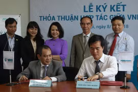 Đại diện ABBANK và VNI ký kết thỏa thuận hợp tác tại buổi lễ. (Nguồn: ABBANK)
