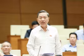 Đại tướng Tô Lâm, Bộ trưởng Bộ Công an trả lời chất vấn của đại biểu Quốc hội. (Ảnh: Phương Hoa/TTXVN)