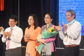 Thí sinh Phạm Thị Cẩm Nguyên (Hội Nhà báo tỉnh Hậu Giang) giành giải nhất Hội thi 'Tiếng hát người làm báo' khu vực miền Đông và Tây Nam Bộ năm 2022. (Ảnh: Tuấn Kiệt/TTXVN)