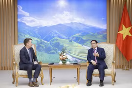 Thủ tướng Phạm Minh Chính tiếp ông Andy Campion, Giám đốc điều hành Tập đoàn Nike. (Ảnh: Dương Giang/TTXVN)