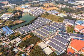 Phía Lào muốn được nghe chia sẻ kinh nghiệm từ Việt Nam liên quan đến các nội dung phát triển khu công nghiệp, phát triển năng lượng tái tạo và năng lượng xanh... (Ảnh: Hồng Đạt/TTXVN)