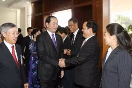 Chủ tịch nước Trần Đại Quang đến thăm, nói chuyện với cán bộ, nhân viên Đại sứ quán Việt Nam và đại diện cộng đồng Việt kiều. (Ảnh: Nhan Sáng/TTXVN)