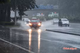 Mưa lớn trong sáng 20/7 ở Bắc Kinh. (Nguồn: THX)