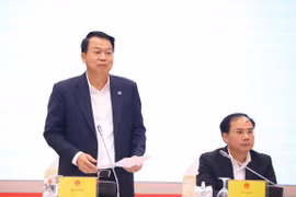 Thứ trưởng Bộ Tài chính Nguyễn Đức Chi trả lời báo chí tại buổi họp báo Chính phủ thường kỳ tháng 11/2022. (Ảnh: Vietnam+)