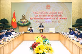 Thủ tướng Phạm Minh Chính làm việc với cán bộ chủ chốt Học viện Chính trị Quốc gia Hồ Chí Minh. (Ảnh: Dương Giang/TTXVN)