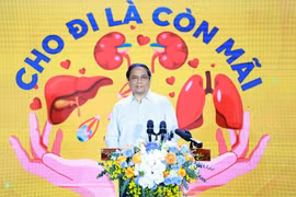 Thủ tướng Phạm Minh Chính phát động Chương trình "Đăng ký hiến tặng mô, tạng - Cho đi là còn mãi.” (Ảnh: Dương Giang/TTXVN)