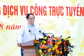 Thủ tướng Phạm Minh Chính phát biểu tại Hội nghị chuyên đề nâng cao hiệu quả cung cấp và sử dụng dịch vụ công trực tuyến. (Ảnh: Dương Giang/TTXVN)