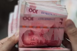 Đồng nhân dân tệ. (Nguồn: AFP/TTXVN)