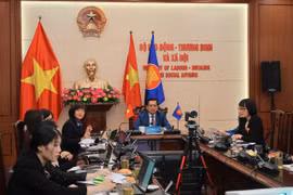 Thứ trưởng Bộ Lao động-Thương binh và Xã hội Nguyễn Bá Hoan chi sẻ về việc thực hiện các cam kết về lồng ghép giới và tăng cường quyền năng cho phụ nữ của Việt Nam. (Ảnh: PV/Vietnam+) 