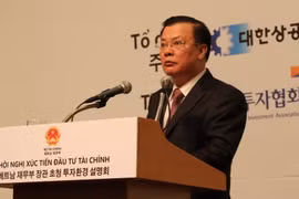 Bộ trưởng Đinh Tiến Dũng phát biểu. (Ảnh: Vũ Toàn-Mạnh Hùng-Hữu Tuyên-Trần Phương/Vietnam+)