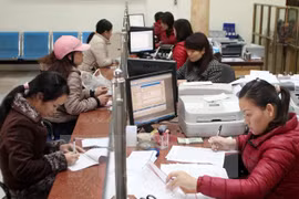 Giao dịch tại Agribank. (Nguồn: TTXVN)