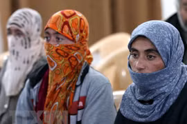 Các con tin người Yazidi được IS trả tự do. (Nguồn: AFP/TTXVN)