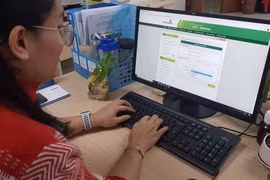Miễn giảm nhiều loại phí khi thanh toán online. (Ảnh: PV/Vietnam+)