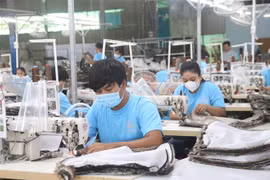 Nhiều doanh nghiệp đang đuối sức trước bối cảnh cầu thị trường trong nước và thế giới sụt giảm mạnh kéo dài. (Ảnh: Thanh Hòa/TTXVN)
