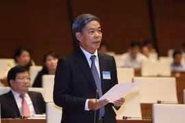 Bộ trưởng Bộ Tài Nguyên và Môi trường Nguyễn Minh Quang trả lời chất vấn. (Ảnh: Phương Hoa/TTXVN)