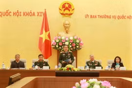 Đại tướng Đỗ Bá Tỵ, Phó Chủ tịch Quốc hội tiếp Đoàn đại biểu Cựu chiến binh Vị Xuyên, tỉnh Hà Giang. (Ảnh: An Đăng/TTXVN)