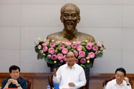 Thủ tướng Nguyễn Xuân Phúc chủ trì phiên họp Ủy ban Quốc gia về biến đổi khí hậu lần thứ 7. (Ảnh: Thống Nhất/TTXVN)