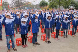 Giáo dục kỹ năng phòng, chống quấy rối và xâm hại tình dục trẻ em cho họ sinh tại Ninh Bình. (Ảnh: Hải Yến/TTXVN)