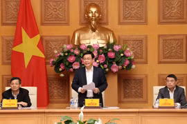 Phó Thủ tướng Vương Đình Huệ, Chủ tịch Hội đồng Tư vấn chính sách tài chính, tiền tệ quốc gia chủ trì cuộc họp. (Ảnh: Văn Điệp/TTXVN)