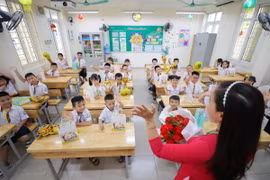 Học sinh Trường Tiểu học Thăng Long, quận Hoàn Kiếm, Hà Nội. (Ảnh: Thanh Tùng/TTXVN)