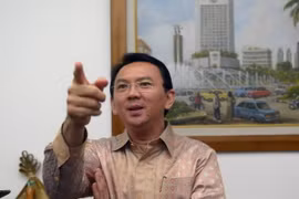 Thị trưởng thành phố Jakarta Basuki Tjahaja Purnama phát biểu trước báo giới tại thành phố Jakarta ngày 14/8/2014. (Ảnh: AFP/TTXVN)