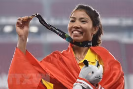 Vận động viên Bùi Thị Thu Thảo giành Huy chương Vàng nội dung nhảy xa nữ tại ASIAD 2018. (Nguồn: AFP/TTXVN)