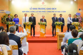 Khai trương giao dịch Hợp đồng tương lai Trái phiếu Chính phủ, ngày 4/7. (Ảnh: BTC/Vietnam+)