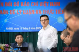  Tổng Biên tập Báo Nhân Dân Lê Quốc Minh chia sẻ tại hội thảo. (Ảnh: THÀNH ĐẠT) 