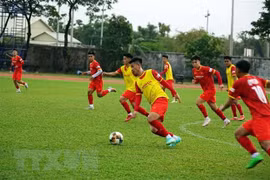 Các cầu thủ U23 Việt Nam trong một buổi tập. (Ảnh: Trần Long/TTXVN) 