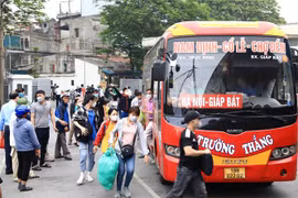 Bảo đảm phục vụ nhu cầu đi lại cho nhân dân dịp nghỉ lễ. (Ảnh: Hoàng Hiếu/TTXVN)